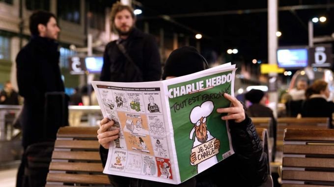 Реакции на възмущение се отприщиха след карикатура на френското сатирично