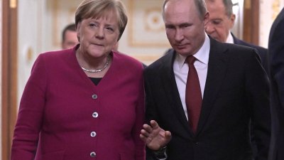 Путин и Меркел обезпокоени от напрежението в Украйна