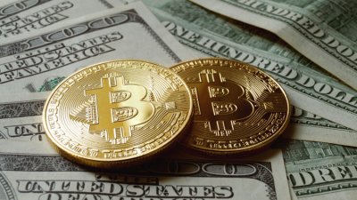 Биткойн приближава нов рекорд от 51 000 долара