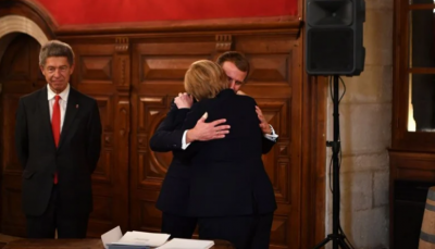 Прощалната прегръдка на Меркел и Макрон 