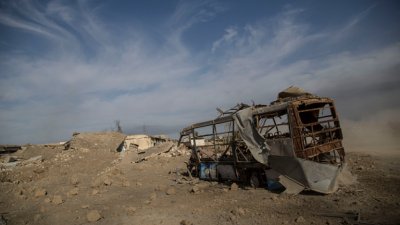 143 тела в масов гроб открити в Ирак