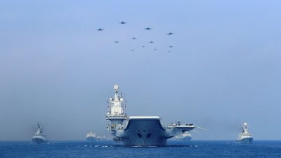 Китайските военни обявиха нови военни учения по море и въздушното