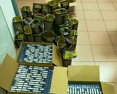 210 кутии 4200 къса цигари в запечатани консерви с кучешка
