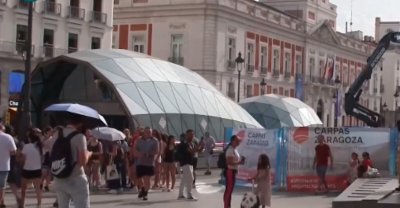 Мадрид воюва с жегите като изгражда козирки