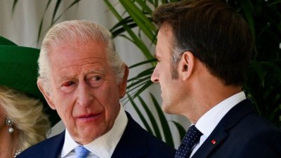 Защо крал Чарлз посрещна Макрон с кървясало око?