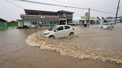 Проливни дъждове взеха жертви в Южна Корея