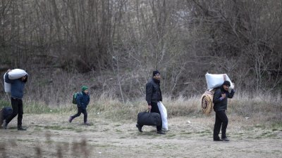 Германия спира приема на бежанци