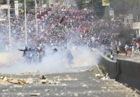 снимка 2 Насилие и смърт завладя Индонезия - най-малко 20 са убити по време на студентски протести (СНИМКИ)